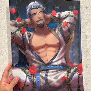 May include: A print featuring a muscular figure with silver hair and a mustache, adorned in a white and blue robe. Red roses and vines decorate the artwork, creating a romantic and artistic aesthetic.