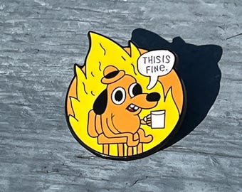 This is Fine Dog Enamel Needle Minder