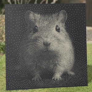 May include: A square black wall art piece featuring a stippled portrait of a hamster created with numerous small white dots. The design uses varying dot density to form the shape, ears, eyes, and nose of the animal against the dark background.