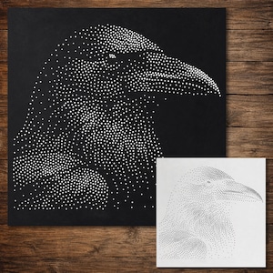 May include: A square black panel featuring a white stippled raven head design created with small dots. Beside it is a smaller square white sheet displaying the same raven head design in black stippled dots, showing the negative image of the artwork.