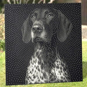 May include: A square black canvas featuring a pointillist portrait of a dog created with white dots. The dog's face and chest are rendered through varying densities of white dots against the solid black background, forming a clear canine image.