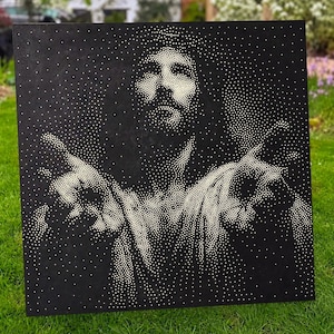 May include: A square black wall art piece featuring a portrait created with white dots. The stippled design depicts a figure with long hair and outstretched arms, using varying dot density to form the facial features, clothing, and hands.