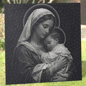 May include: A square black wall art piece featuring a pointillist style illustration of a mother figure holding a child. The image is created using numerous small white dots against the dark background, forming the outlines and features of the figures.