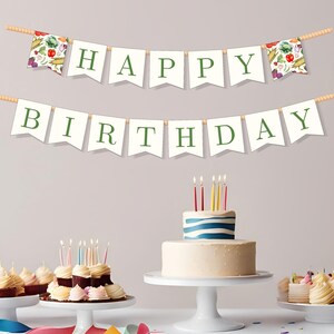 May include: A festive birthday scene with a banner that reads "HAPPY BIRTHDAY" in green letters. The scene includes a cake with candles, cupcakes, and a banner with vegetable illustrations.