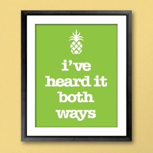 May include: A framed print with a green background and white text that reads "i've heard it both ways". A white pineapple graphic is above the text.