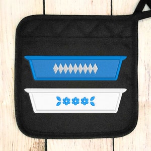May include: A black pot holder with two embroidered designs. The top design is a blue rectangle with a white diamond pattern. The bottom design is a white rectangle with a blue floral pattern.