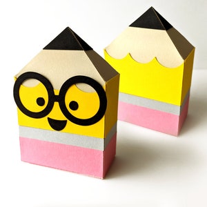 Lápiz caja de regalo con gafas nerd diseño SVG