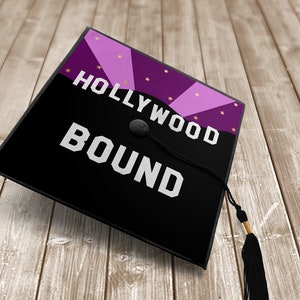 May include: Black graduation cap with a purple and pink design featuring gold stars and the text "HOLLYWOOD BOUND".