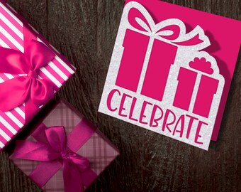 May include: A pink and white striped gift box with a pink bow, a smaller pink and brown plaid gift box with a pink bow, and a pink card with a white glitter design of two gift boxes and the word "CELEBRATE".
