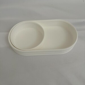 witte container voor alles, lege zakken, sleutelhanger