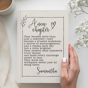 May include: A beige book with the words "A new chapter" and a heart symbol. The text below reads, "They became more than just a coworker..." and is signed "Samantha". A cup of coffee and flowers are in the background.