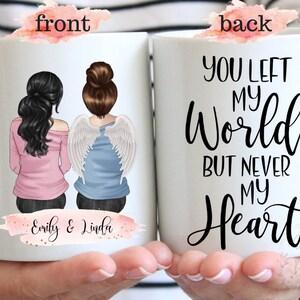 Puede incluir: Taza de cer&aacute;mica blanca con un dise&ntilde;o de dos figuras, una con alas de &aacute;ngel. La parte delantera de la taza tiene los nombres "Emily & Linda" en una pancarta rosa. La parte trasera de la taza tiene el texto "You left my world but never my heart."