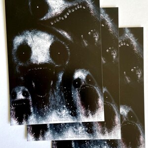 Dark surrealism monster print featuring four screaming heads in a black void, gothic wall decor.
