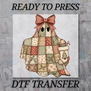 May include: A whimsical DTF transfer design featuring a ghost in a patchwork quilt. The ghost wears a bow and holds a Christmas stocking. The design includes the text "READY TO PRESS" and "DTF TRANSFER".