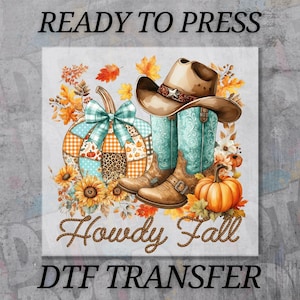 May include: A fall-themed DTF transfer design featuring a cowboy hat, turquoise boots, and a patchwork pumpkin. The design includes sunflowers, autumn leaves, and the text "Howdy Fall". The words "Ready to Press" and "DTF Transfer" are also present.