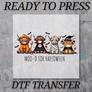 May include: A DTF transfer featuring four Highland cows dressed in Halloween costumes. One cow is in a pumpkin costume, another in a vampire cape, a third wrapped in bandages, and the last in a witch hat. The text "MOO-D FOR HALLOWEEN" is below the cows.