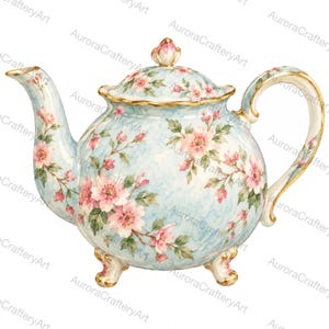 Puede incluir: Una tetera de porcelana con fondo jaspeado azul claro, decorada con motivos florales rosas, hojas verdes y bordes dorados en el pico, el asa, la tapa y las tres patas. La tapa está rematada con un remate en forma de capullo.