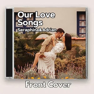 May include: CD case with the text "Our Love Songs" and the names "Seraphina & Adrian." The front cover features a couple embracing in front of a house. The words "Front Cover" are at the bottom of the case.