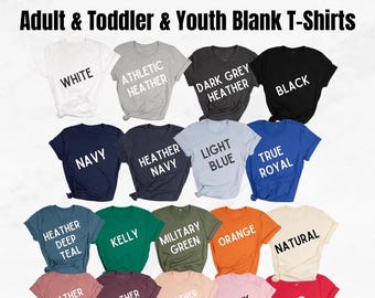 May include: A display of blank t-shirts in various colors, including white, black, navy, and red. The shirts are labeled with their color names, such as "Athletic Heather," "Light Blue," and "Pink." The text "OUTLASH WEAR" and "Adult & Toddler & Youth Blank T-Shirts" are at the top.