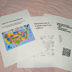 May include: Three white paper sheets featuring educational United States map activities. One sheet shows a colorful map with the text Map Of The United States, while the others include a black and white outline map, text instructions, and a QR code.