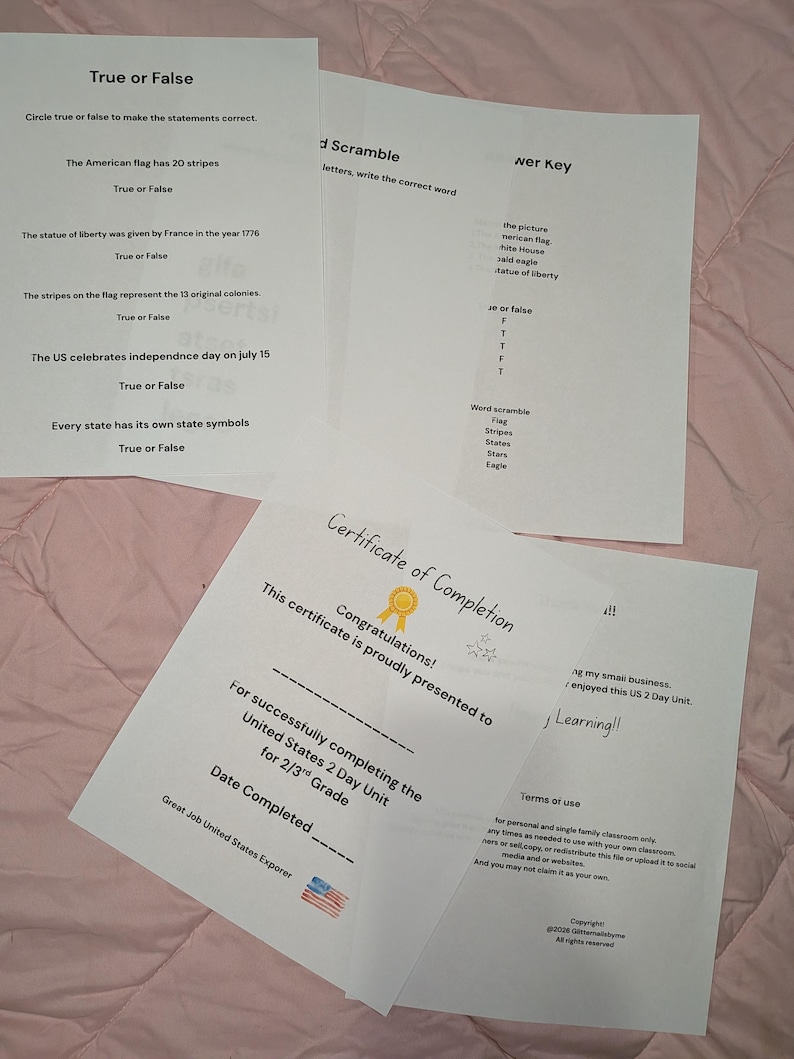 May include: A set of printed educational worksheets for a United States history unit, including a True or False quiz, a word scramble, an answer key, and a Certificate of Completion for 2nd and 3rd grade students, featuring black text on white paper.