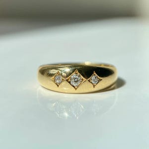 18ct Gold 3 Stone Diamond Flush Set Ring