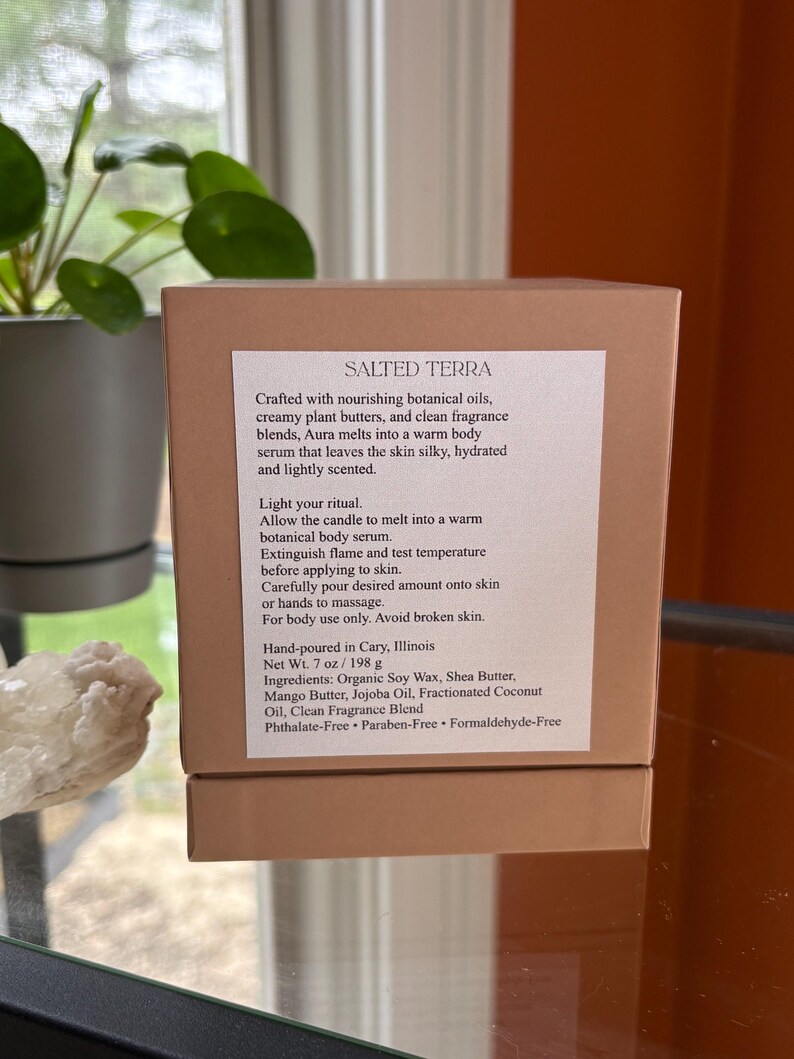 May include: A brown box with the text "SALTED TERRA" and product information. The box contains a body serum with botanical oils and fragrance blends. The net weight is 7 oz (198 g).