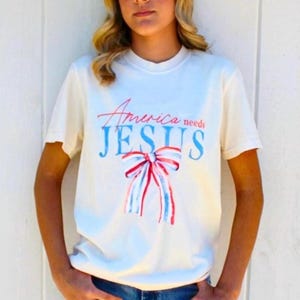 America Needs Jesus T-Shirt  Christian Patriotic Tee, 4th of July Faith Shirt, Red White and Blue Jesus Shirt, Religious USA Graphic Tee