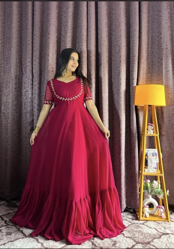 Elegant Georgette Gown with Net Koti Design work