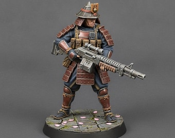 May include: A miniature figurine of a futuristic samurai warrior wearing brown segmented armour over a dark blue uniform, a conical helmet, and tactical gear. The figure holds a large, detailed sci-fi rifle and stands on a stone-textured base.