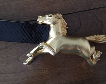 Margarita Barrera Gold tone galloping wild eye horse belt buckle 1991 mint condition comes with nice faux snakeskin black leather belt