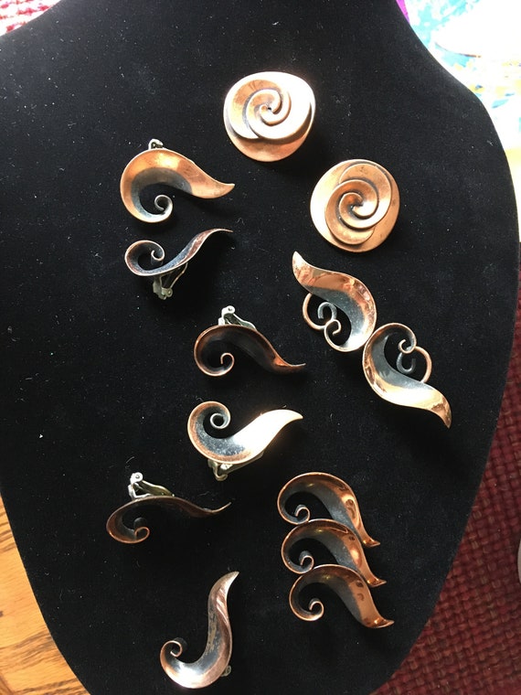 Copper by Bell lot. Two brooches, three sets of ea