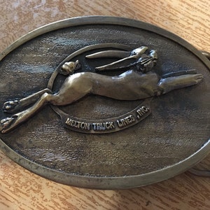 Melton Truck Lines belt buckle Rabbit bunny hare remarkable rewards Shreveport Louisiana large relief leaping rabbit vintage preowned