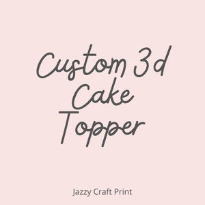 May include: A light pink background with the words "Custom 3d Cake Topper" in dark gray cursive script. Below the text is the phrase "Jazzy Craft Print" in a smaller, sans-serif font.