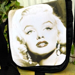 Marilyn Monroe Hand Purse. This small, black beaded hand purse with, Lot  #20072