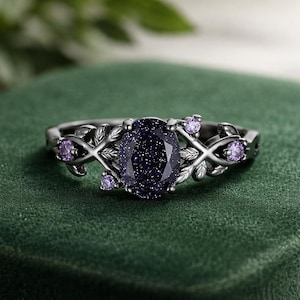 Onyx stormfantasie sprankelende zwarte en violette steen zandsteen statement ring