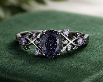 Onyx storm fantasy sparkly black and violet stone sandstone statement ring