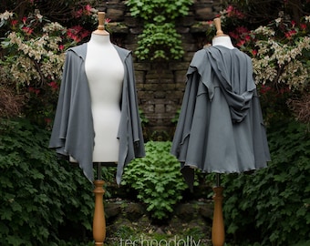 May include: A gray hooded cape with a long, flowing design. The cape is made of a soft, comfortable fabric and has a relaxed fit.