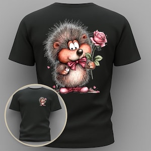 Peut inclure: T-shirt noir avec un hérisson de dessin animé tenant une rose rose. Le hérisson porte un nœud papillon et des chaussures roses. Une version plus petite du motif est sur la zone de la poche. Le design est fantaisiste et romantique.