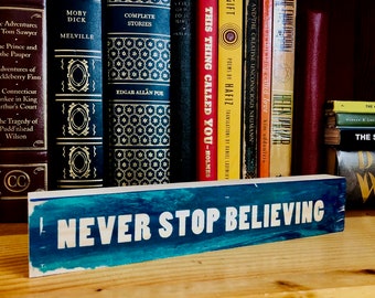 NEVER STOP BELIEVING