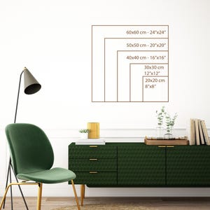 May include: A wall art display showing framed sizes: 60x60 cm (24"x24"), 50x50 cm (20"x20"), 40x40 cm (16"x16"), 30x30 cm (12"x12"), and 20x20 cm (8"x8"). The artwork is displayed above a green cabinet with gold handles.