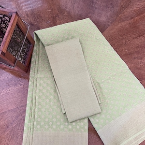 Pista Green Semi Georgette Banarasi Silk Saree with Blouse Piece