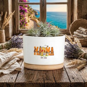 May include: A set of three ceramic nesting bowls in shades of blue, green, and white. The bowls feature a speckled glaze and a simple, modern design. The largest bowl is approximately 6 inches in diameter.