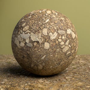 May include: A spherical object made of a mosaic of small pebbles and stones in shades of brown, tan, and grey. Lighter-coloured stones form a band around the sphere. The background is a muted green. The sphere is resting on a stone surface.