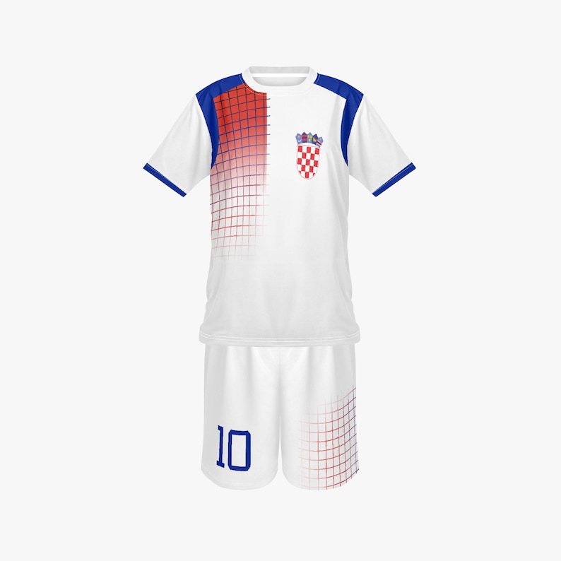 May include: White soccer uniform with blue and red accents. The jersey has a red and blue gradient design on the shoulder and a Croatian coat of arms. The shorts have the number 10 in blue.