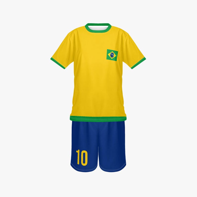 May include: A yellow soccer jersey and blue shorts set. The jersey has green trim on the sleeves and collar, and a Brazilian flag patch on the chest. The shorts have the number 10 in yellow.
