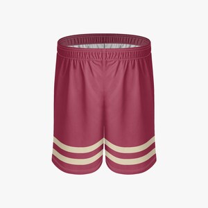 May include: Maroon athletic shorts with two cream stripes near the hem. The shorts feature an elasticated waistband and a relaxed fit, suitable for sports or casual wear.