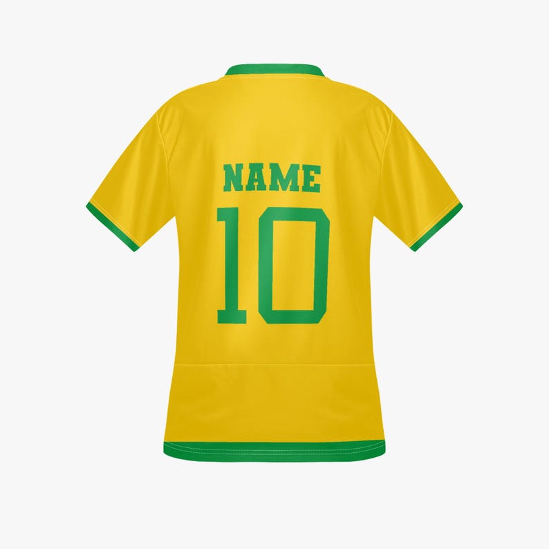 May include: A yellow soccer jersey with green trim, the back displaying the number 10 and the word "NAME" in green block letters. The jersey has short sleeves and a crew neck.