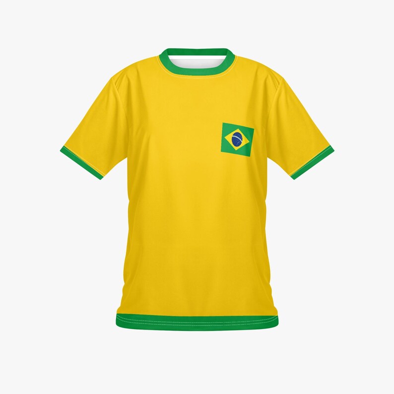 May include: A yellow t-shirt with green trim on the collar, sleeves, and hem. The shirt features the Brazilian flag on the upper left chest. The flag is green, blue, and yellow.