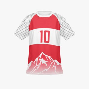 May include: Red and white athletic jersey with the number 10 in red. The jersey features a white horizontal stripe across the chest and a mountain graphic at the bottom. The sleeves are white with a dotted pattern.